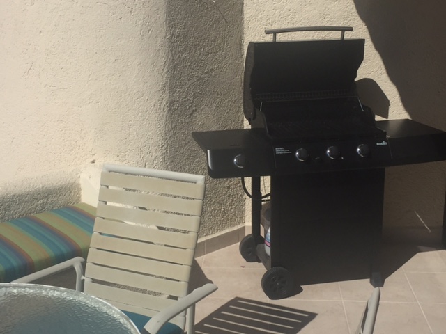 gas grill and deck of terrsol beachfront resort condos in cabo san lucas mexico