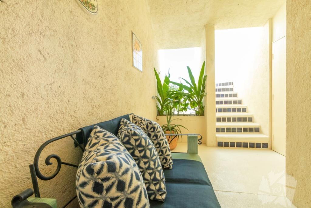 entrance hall to roof deck of terrasol beach resort condo for rent in cabo