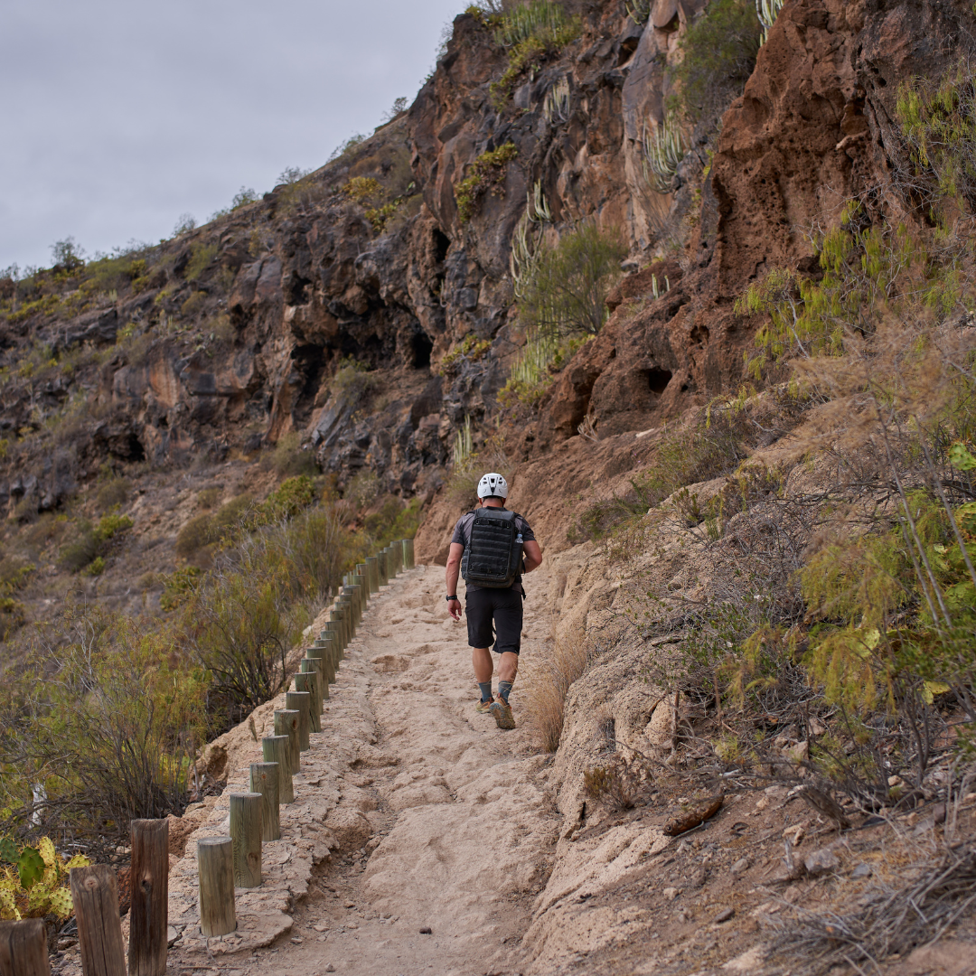Traveler on a scenic desert trail during guided nature hikes in Cabo San Lucas, exploring Baja desert eco tours.